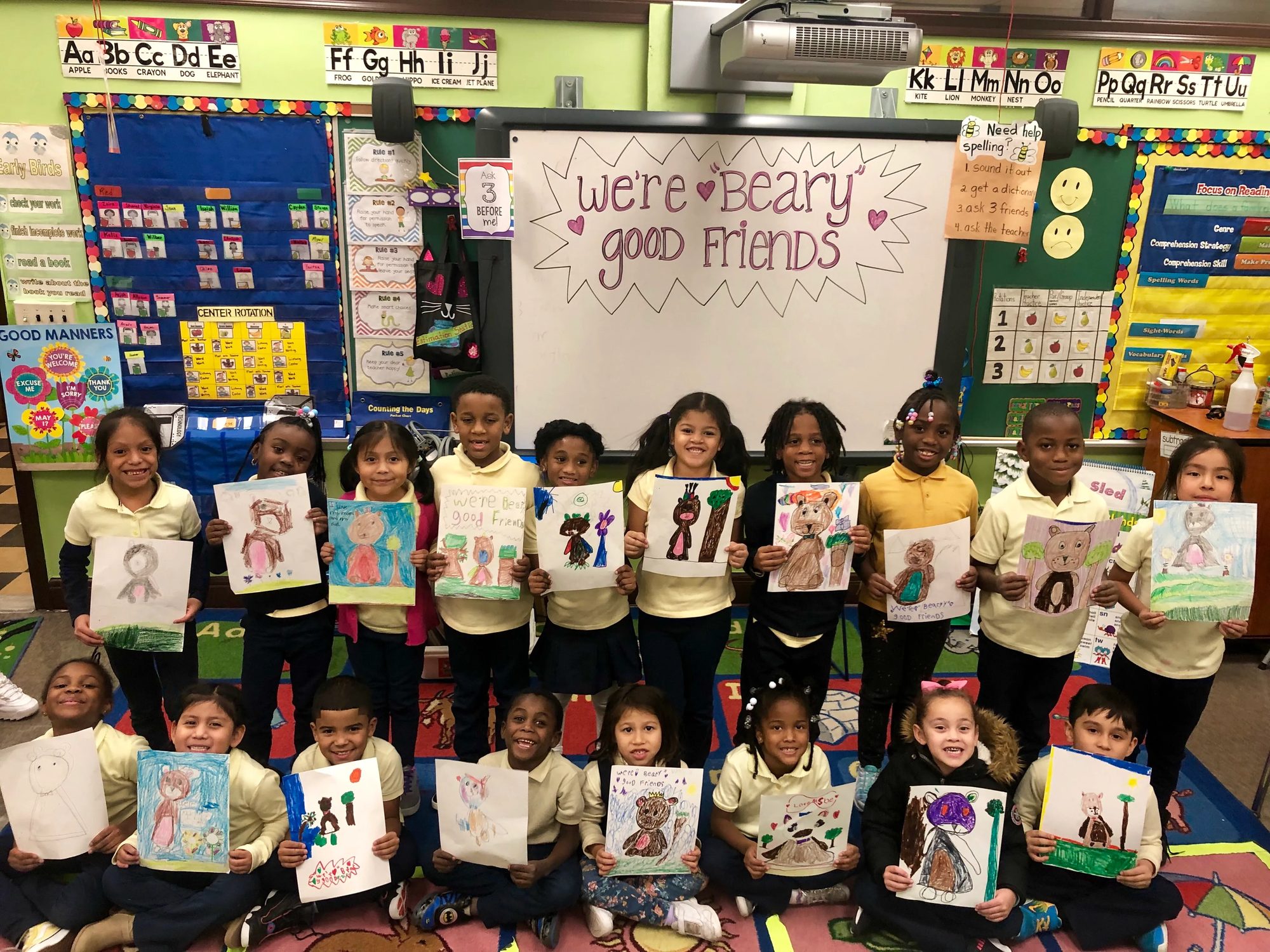 Team Walker After School Program students with their classroom artwork